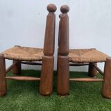 Pair of antique low fire chairs made of wood and straw