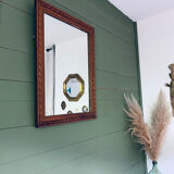 Ancient mirror in carved wood and mercury  48x63cm