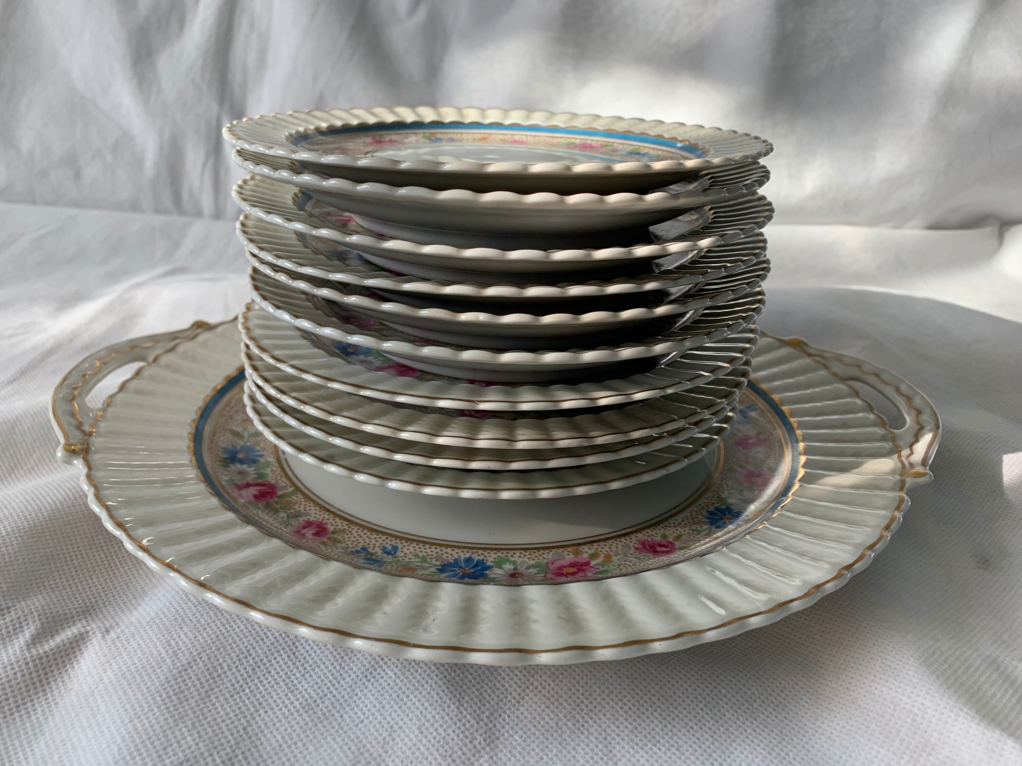 Dessert service 10 plates and a Bernardaud Limoges porcelain cake dish