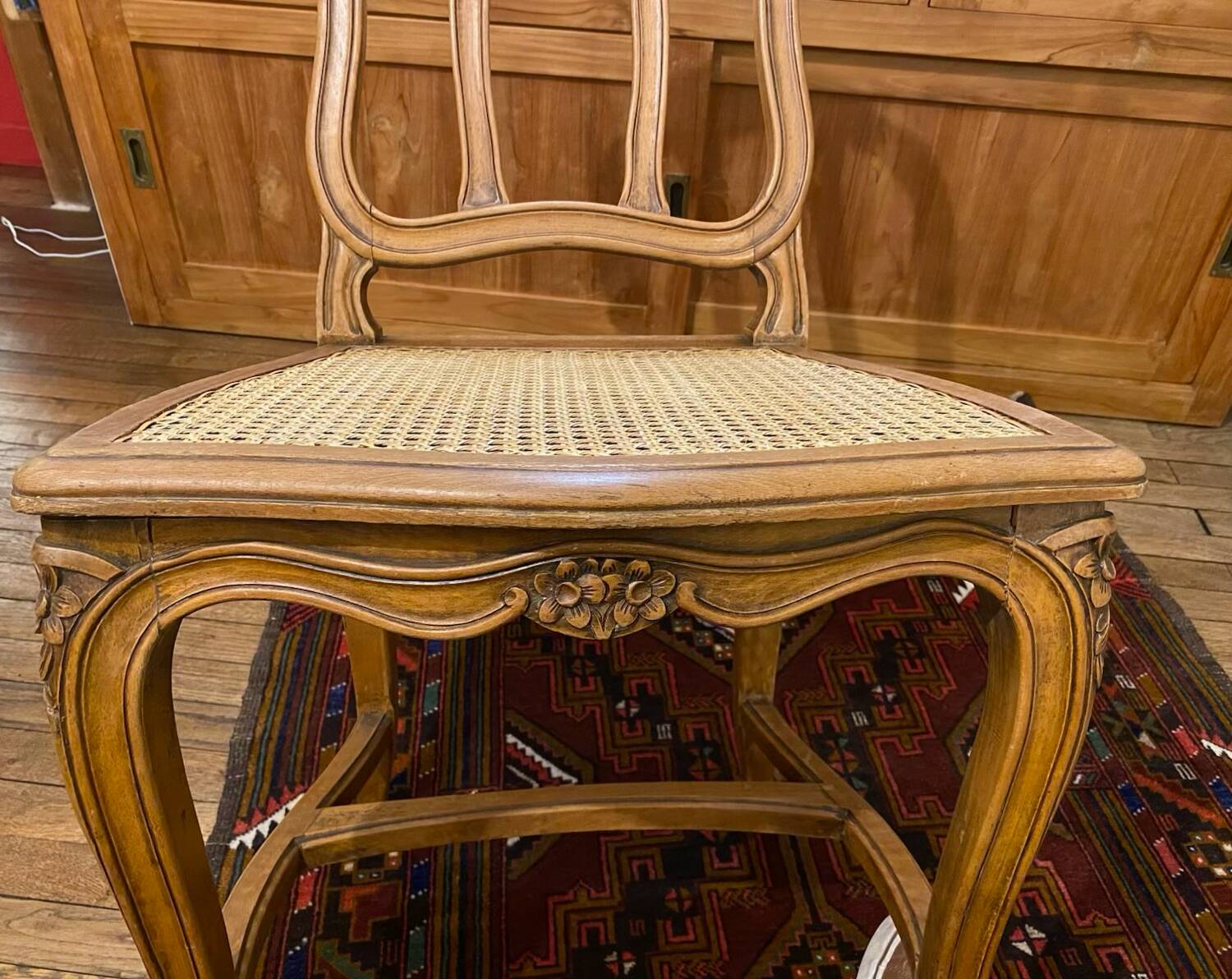 1 caned beech chair, 1950s