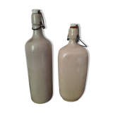 Pair of sandstone bottles