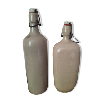 Pair of sandstone bottles