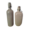 Pair of sandstone bottles