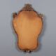 Antique baroque-style mirror in carved wood, Italy, 19th century.