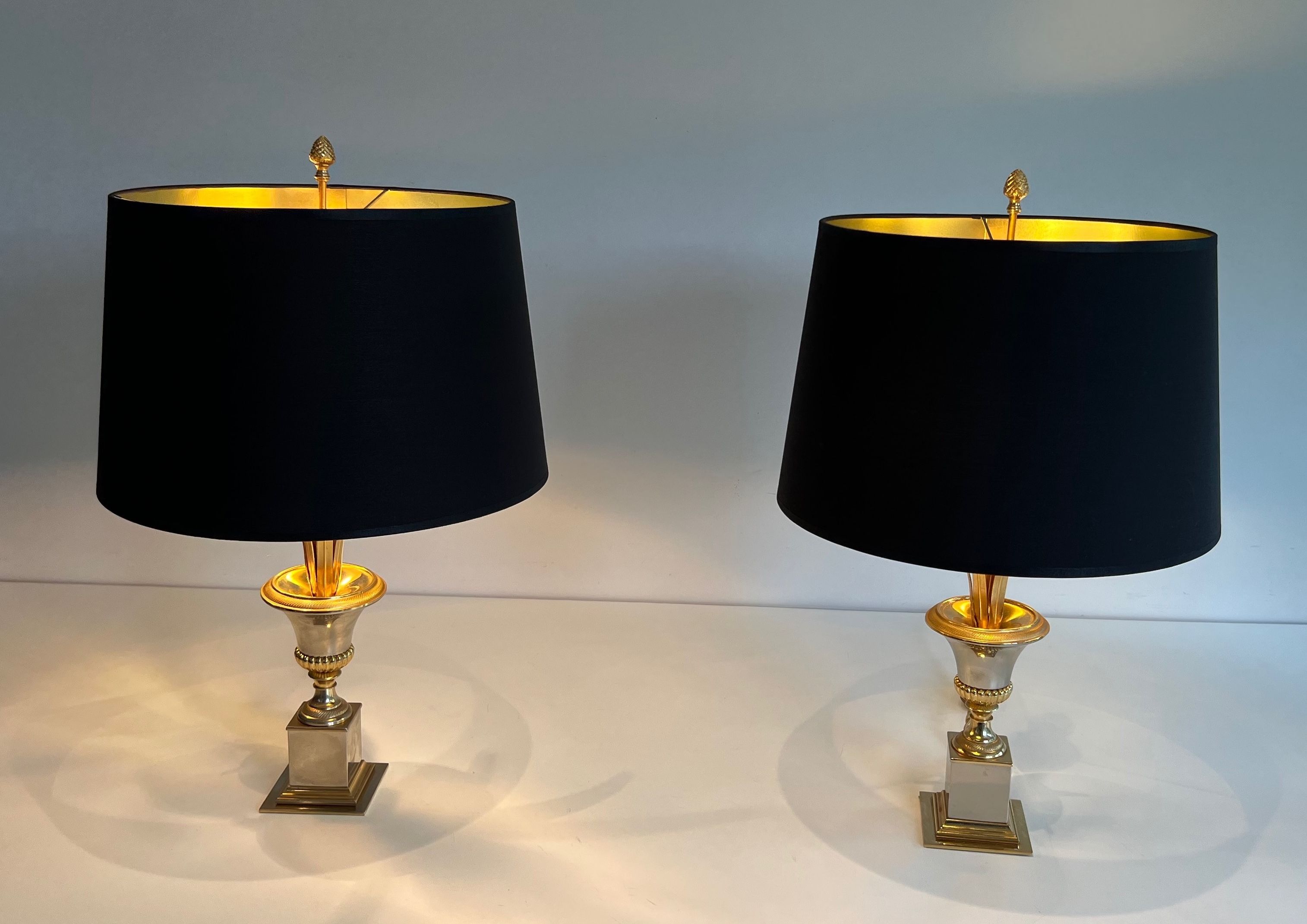 Pair of palm lamps in chrome and brass in the style of Maison Charles. Circa 1970.