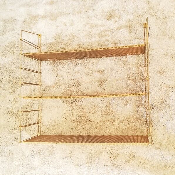 Brass gold metal wall shelf