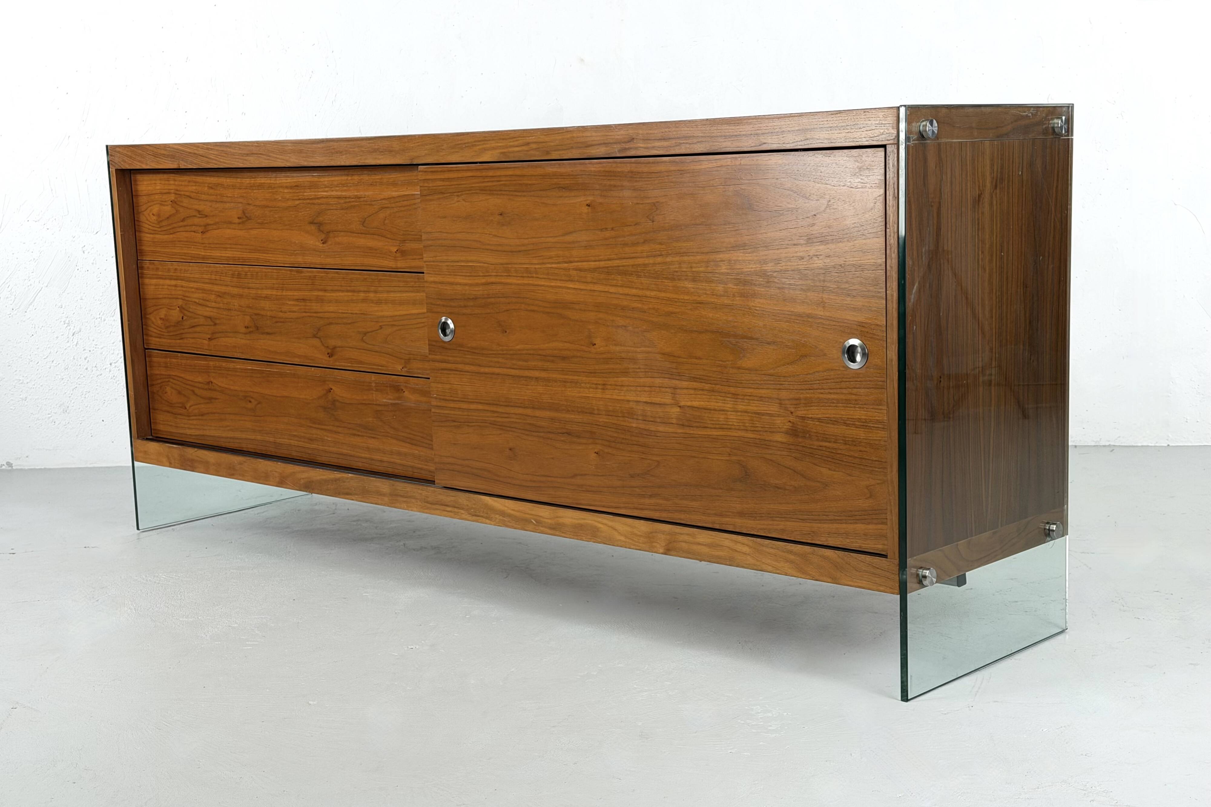 Teak sideboard with glass legs, France - 1990s