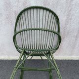 Green rattan armchair