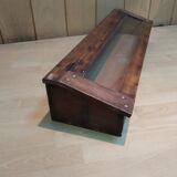 Former wooden display case