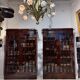 Pair of Empire period mahogany bookcases with flame pattern from the 19th century.