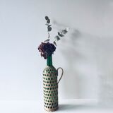 Decorative bottle with wicker