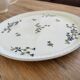 Ancient dish with floral decoration