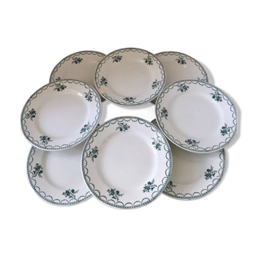 Set of Terre de Fer plates with green floral decoration, St Amand