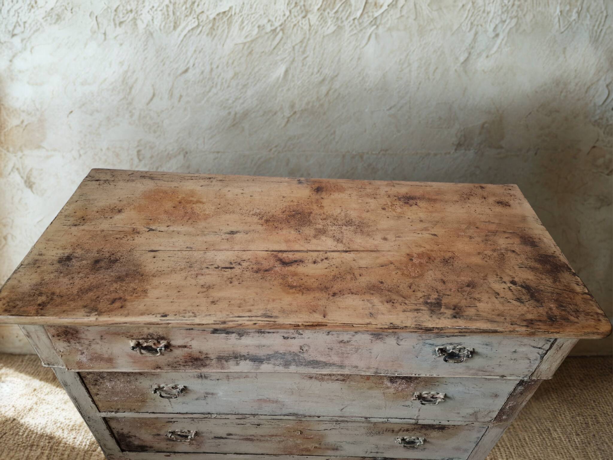 Antique patinated chest of drawers