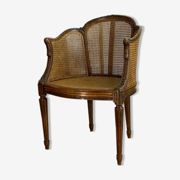 Fauteuil ancien à double cannage en noyer sculpté de style Louis XVI du XIXème