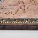 Antique tapestries framed in repoussé brass.