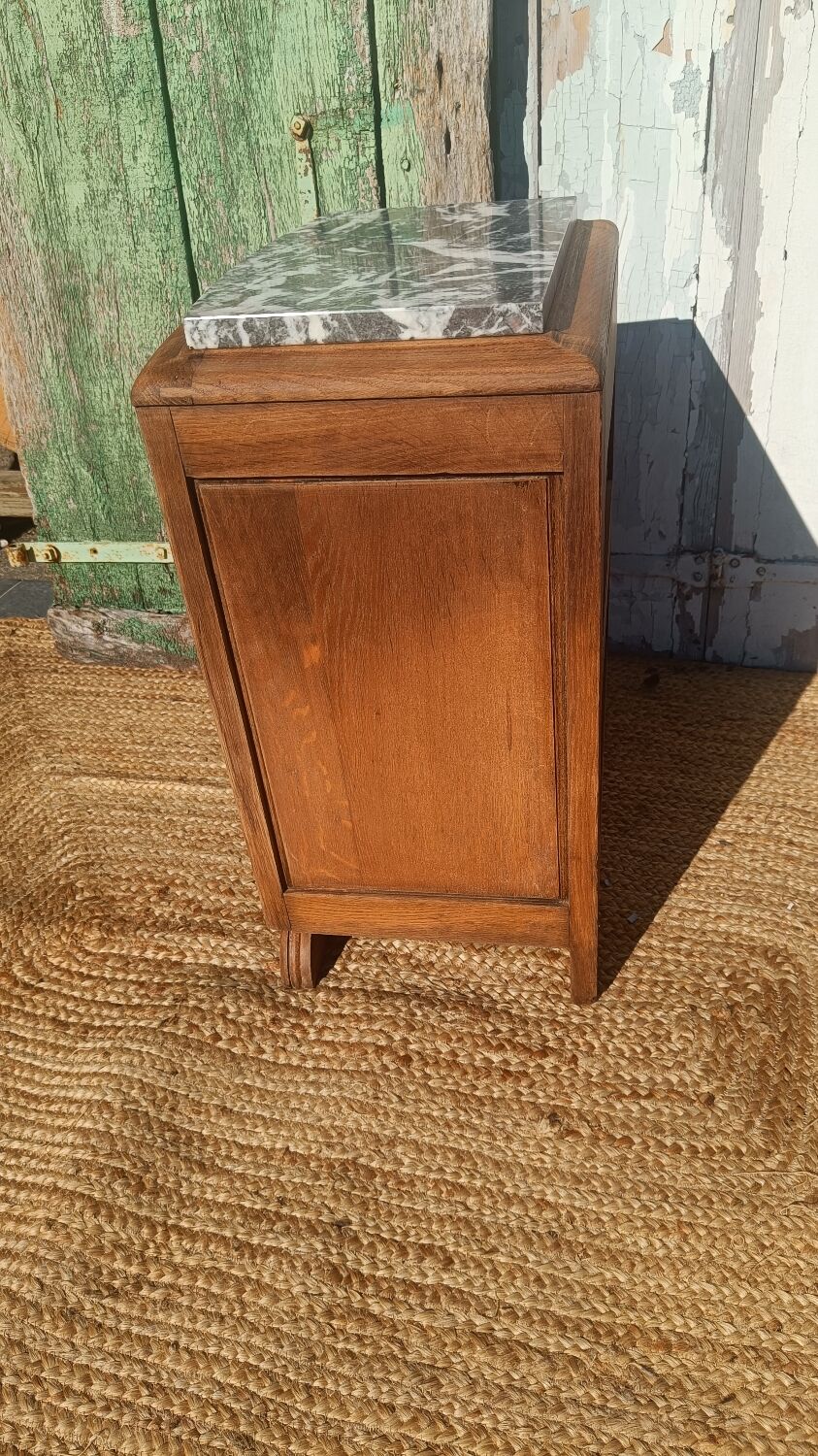 Antique bedside table in solid oak with a marble top.
