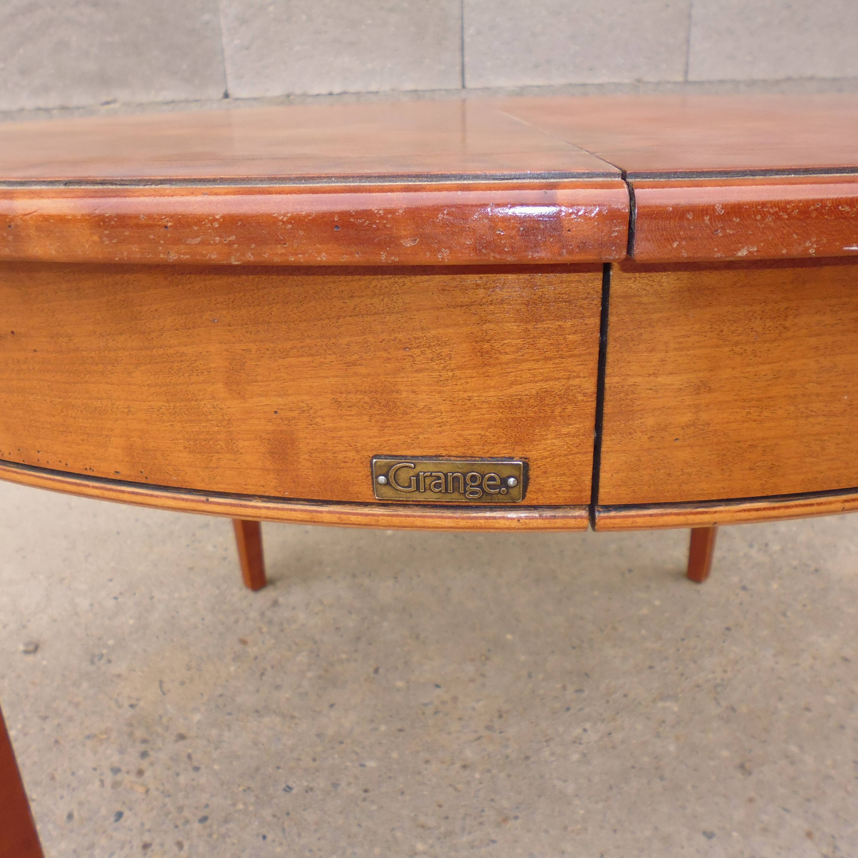 Round table and marquetry with extension