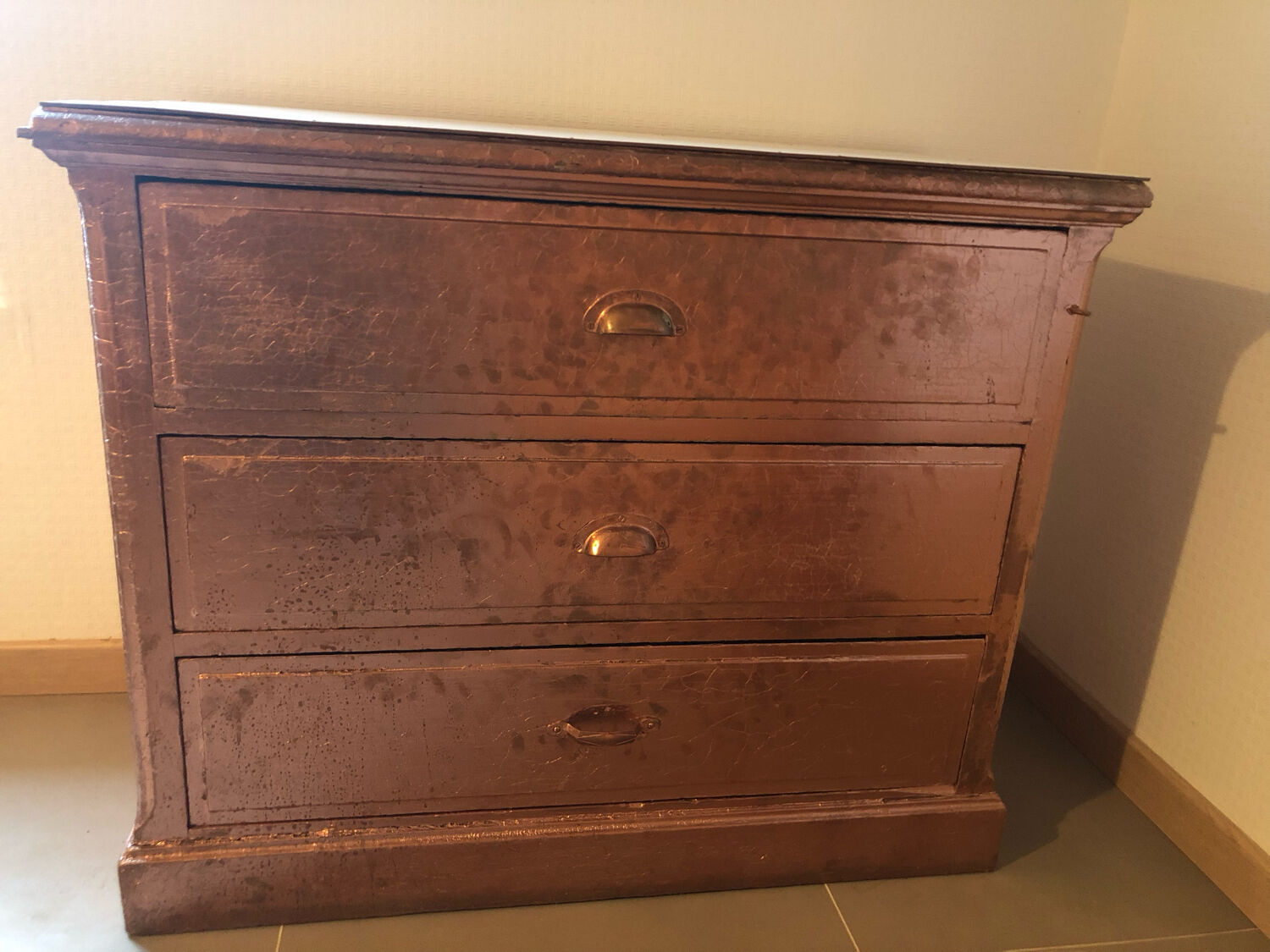 Old chest of drawers restored golden copper color