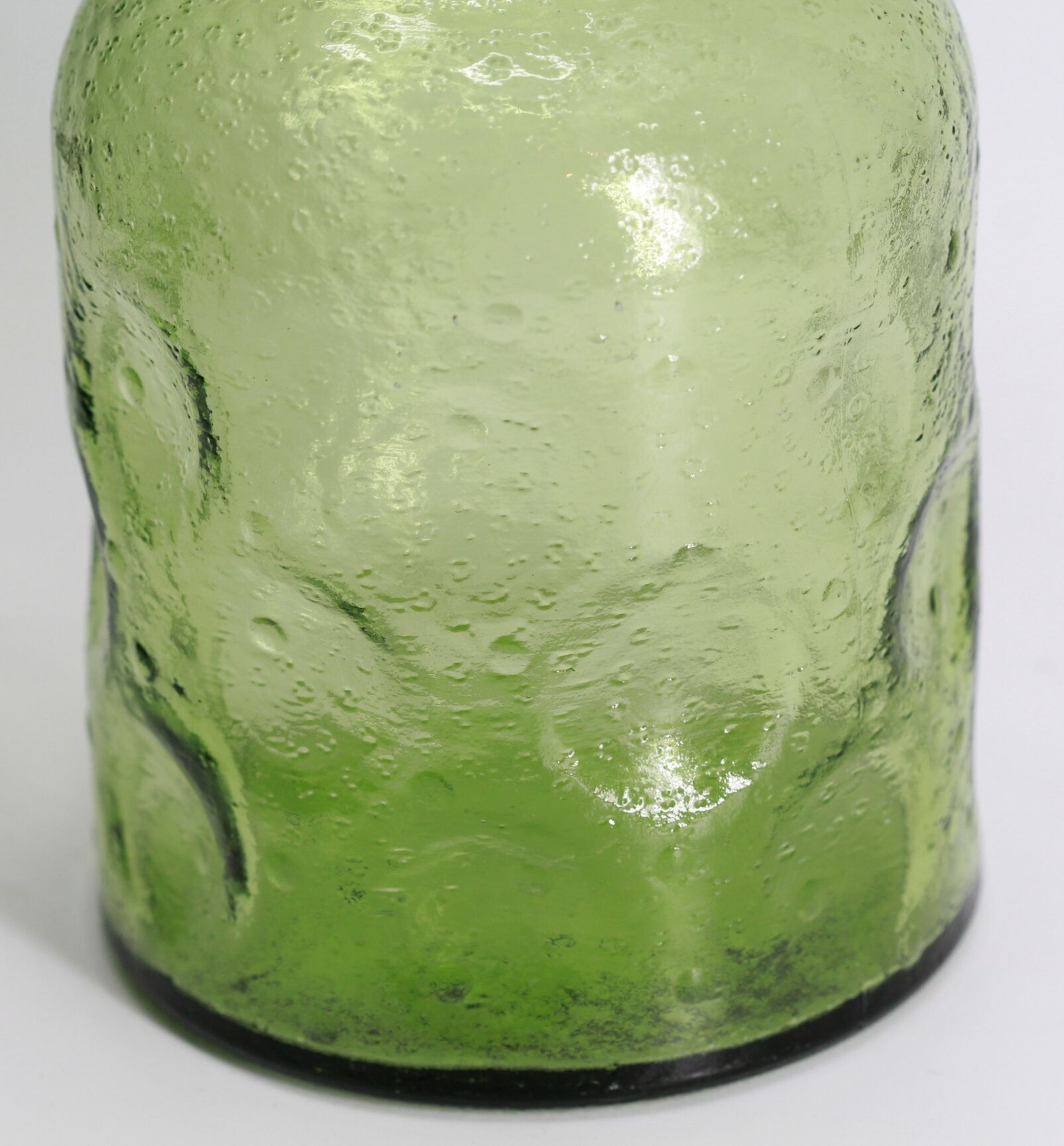 Green bottle made of old glass