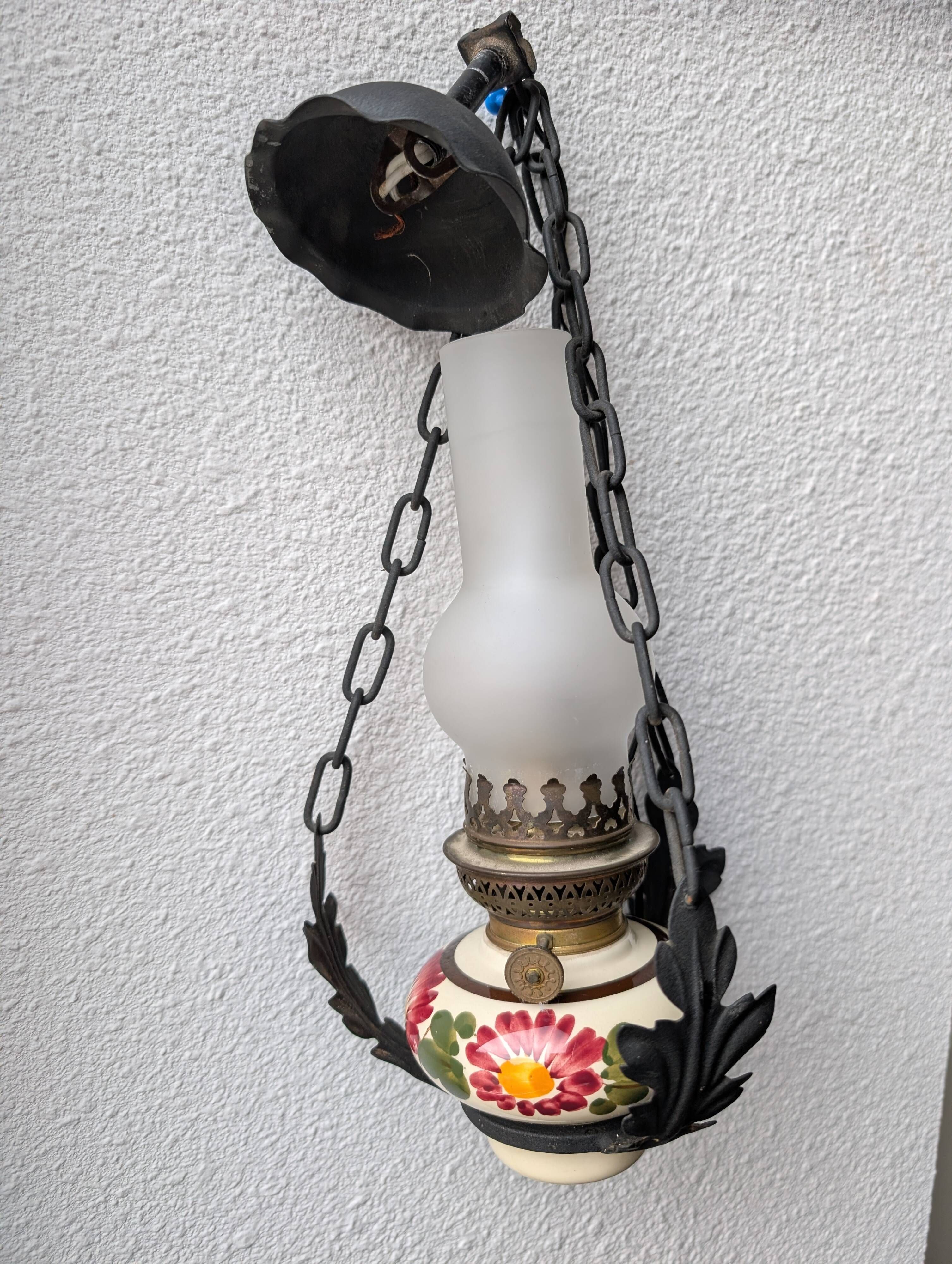 Vintage style suspension oil lamp.