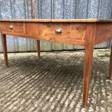 Poplar wood table with 2 front drawers from the Reconstruction period.