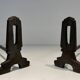 Pair of Modernist Andirons in Cast Iron with Openwork Uprights and Tripod Bases