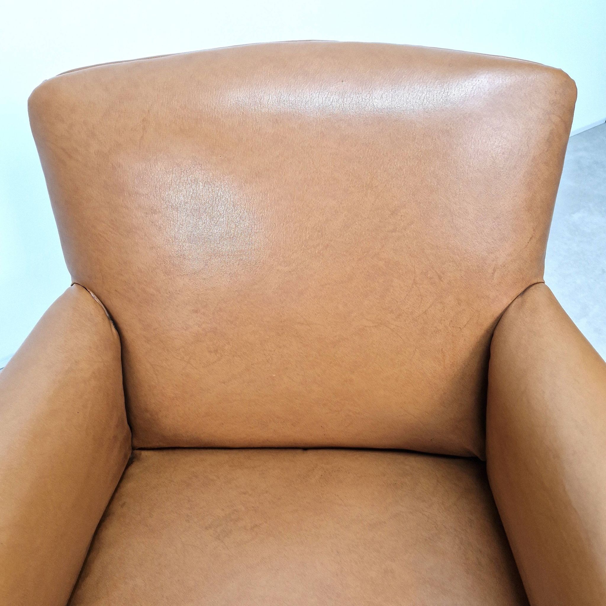 50s club chair in imitation leather and wood