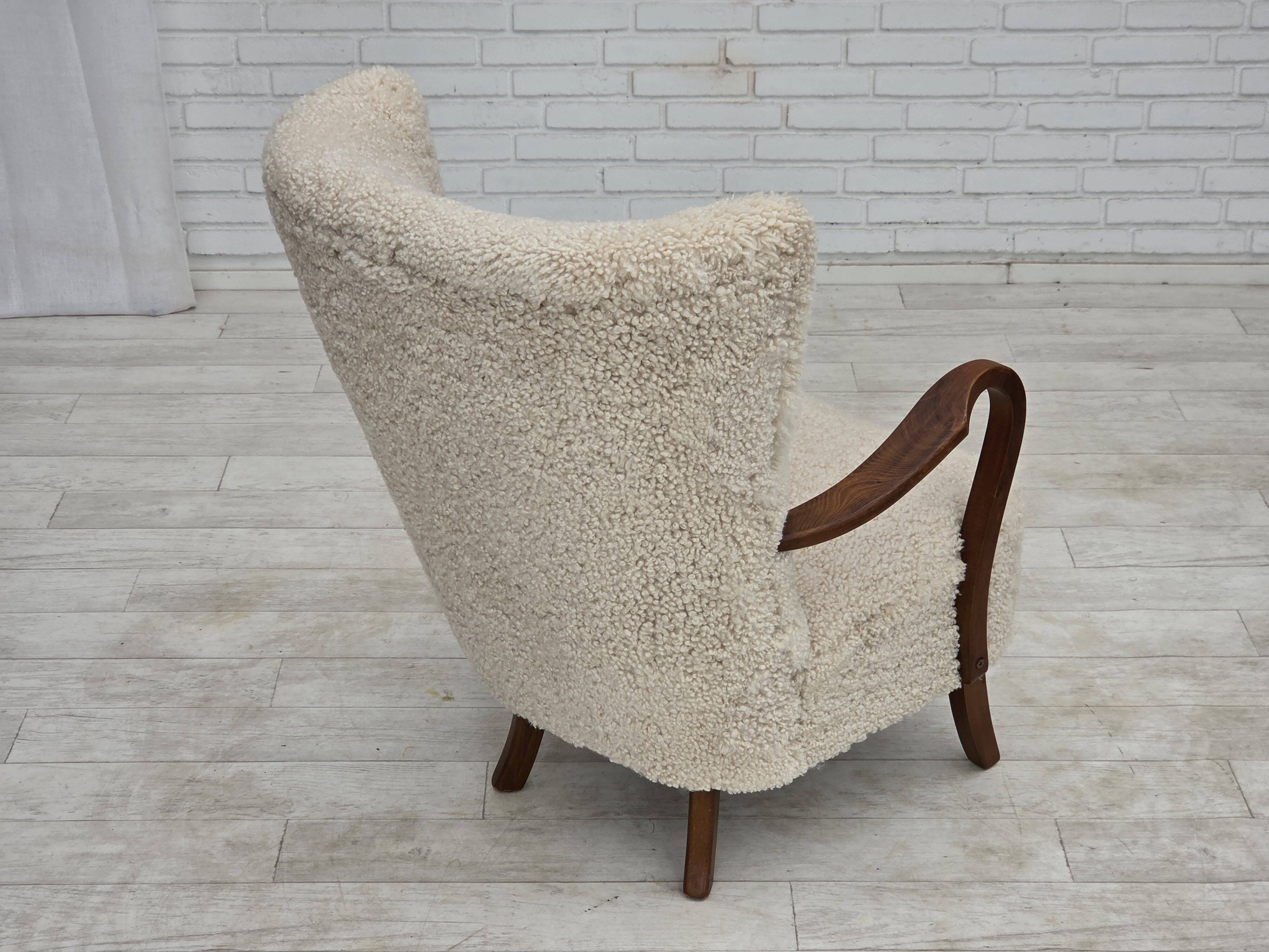 1960s, Danish design by Alfred Christensen, reupholstered, sheepskin.