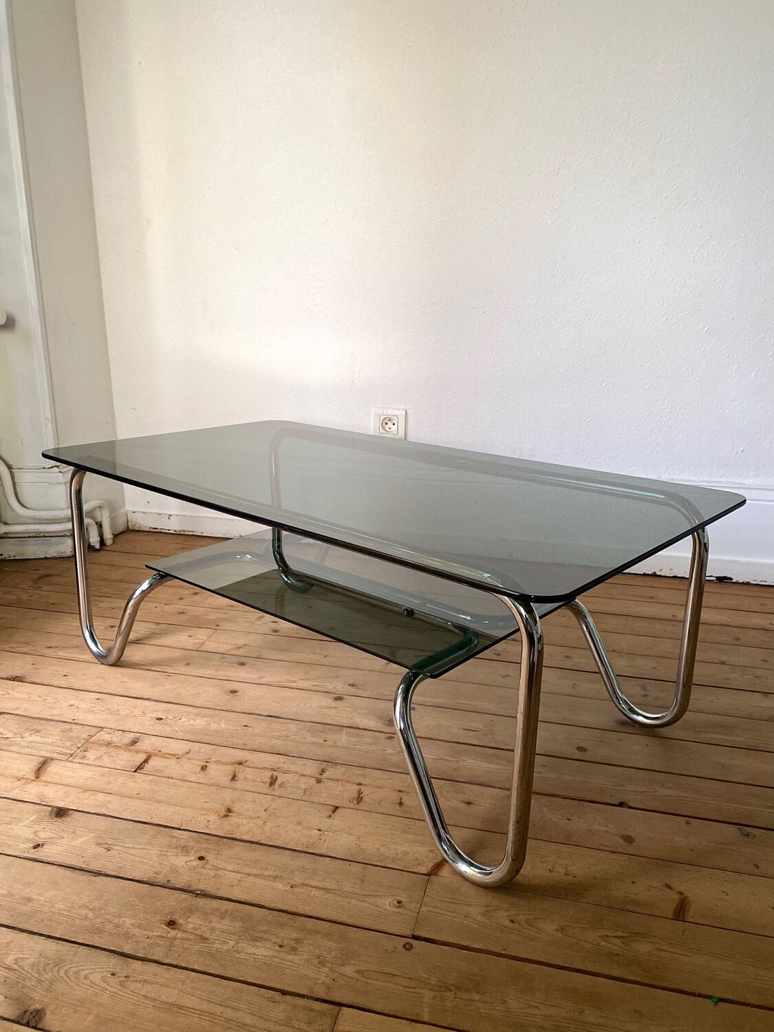 Tubular frame smoked glass coffee table 1970 vintage