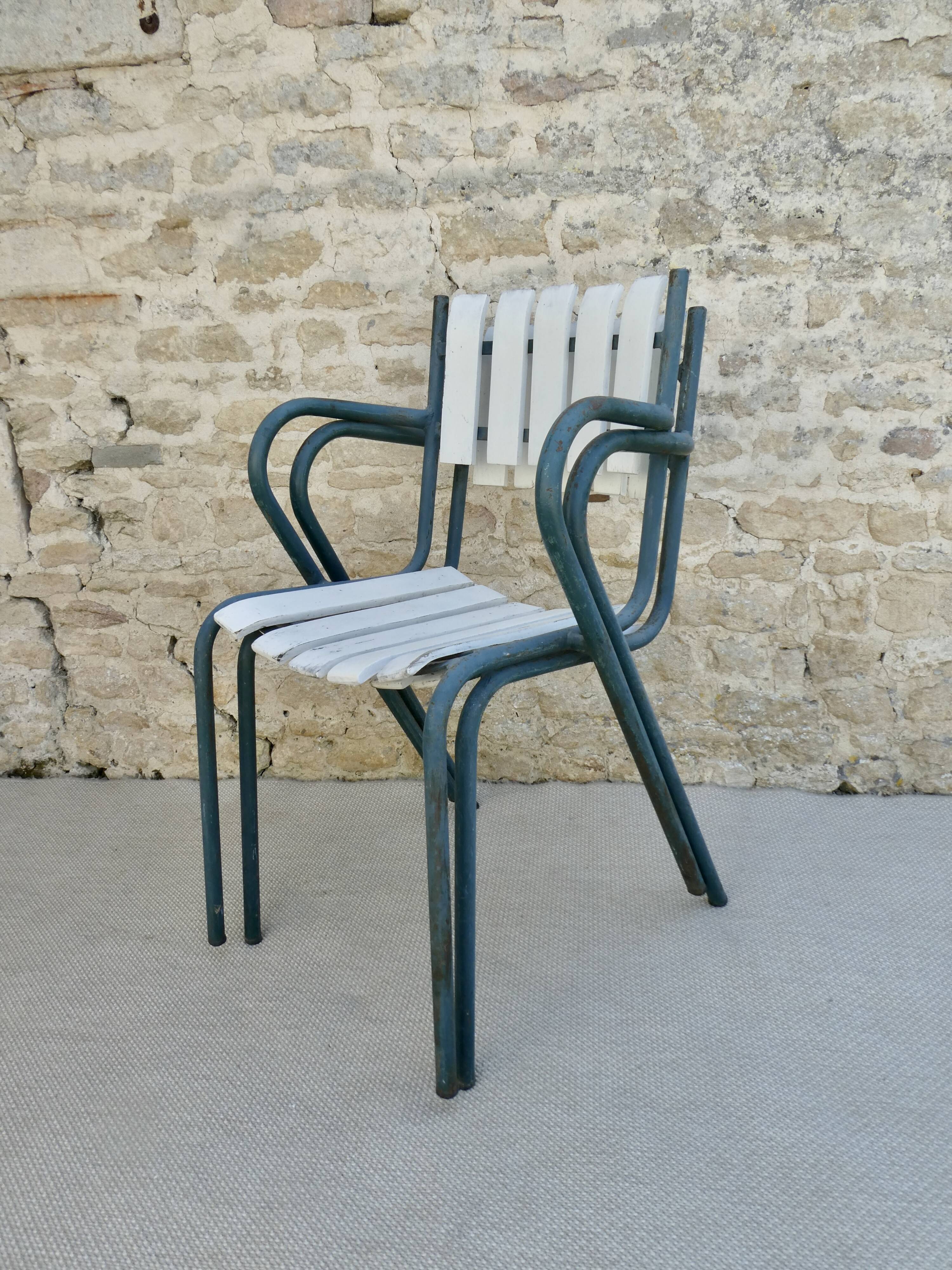 Pair of wooden and metal armchairs from the 60s