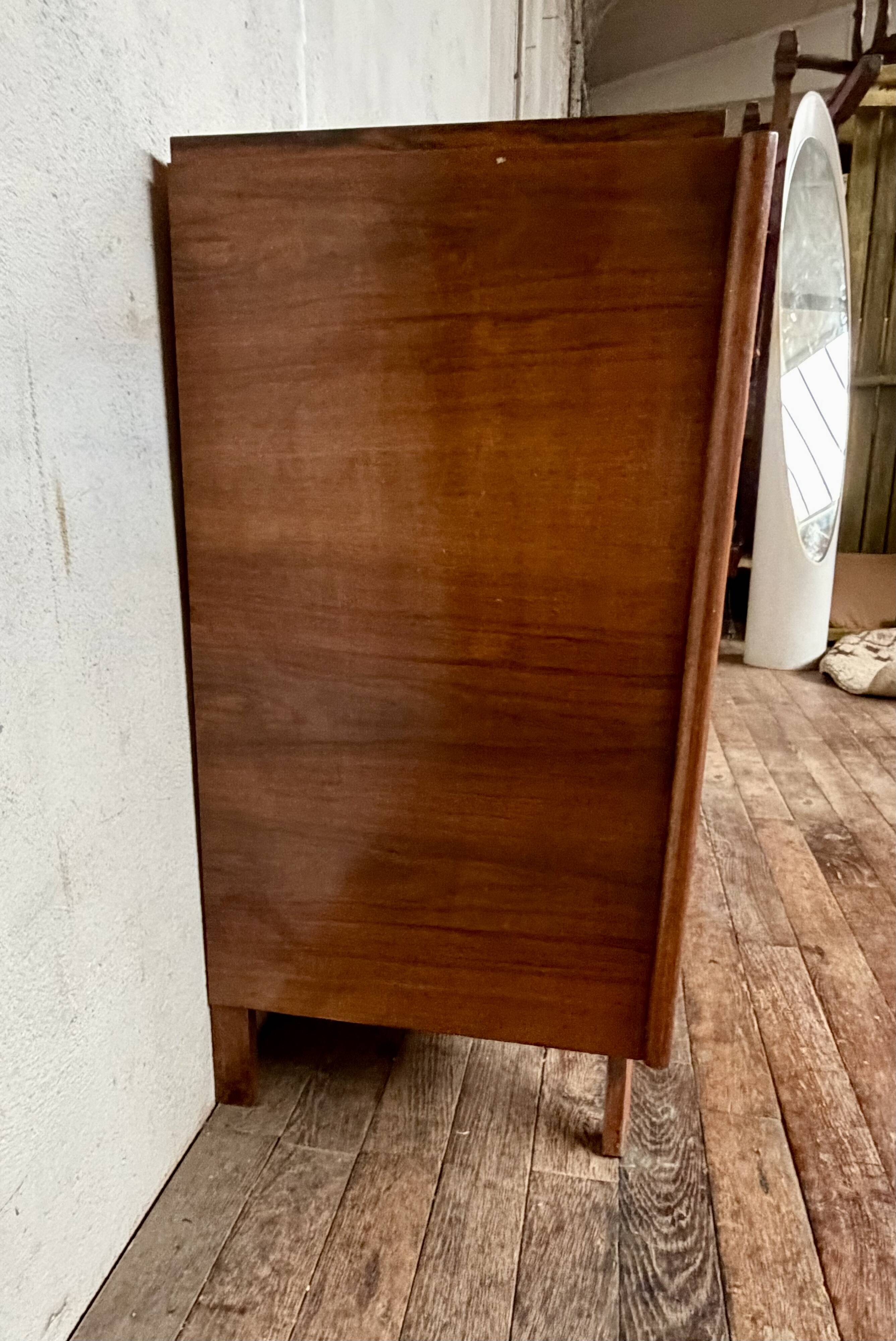 Art Deco vintage commode with tapered legs.