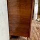 Art Deco vintage commode with tapered legs.
