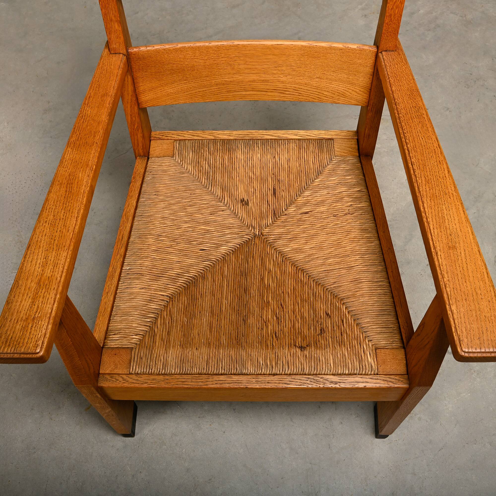 Art Deco Haagse School Armchair in solid Oak and Straw, 1930s