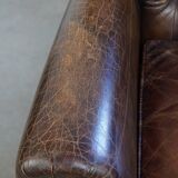 Cognac colored brown grained cowhide chesterfield armchair