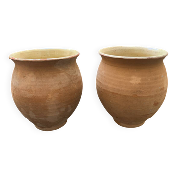 Pair of terracotta and ceramic pots