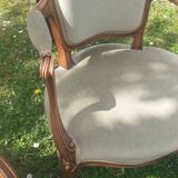 Pair of Rocaille style armchairs in green fabric and walnut, 19th century