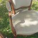 Pair of Rocaille style armchairs in green fabric and walnut, 19th century