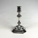 Pair of antique candlesticks in silver metal