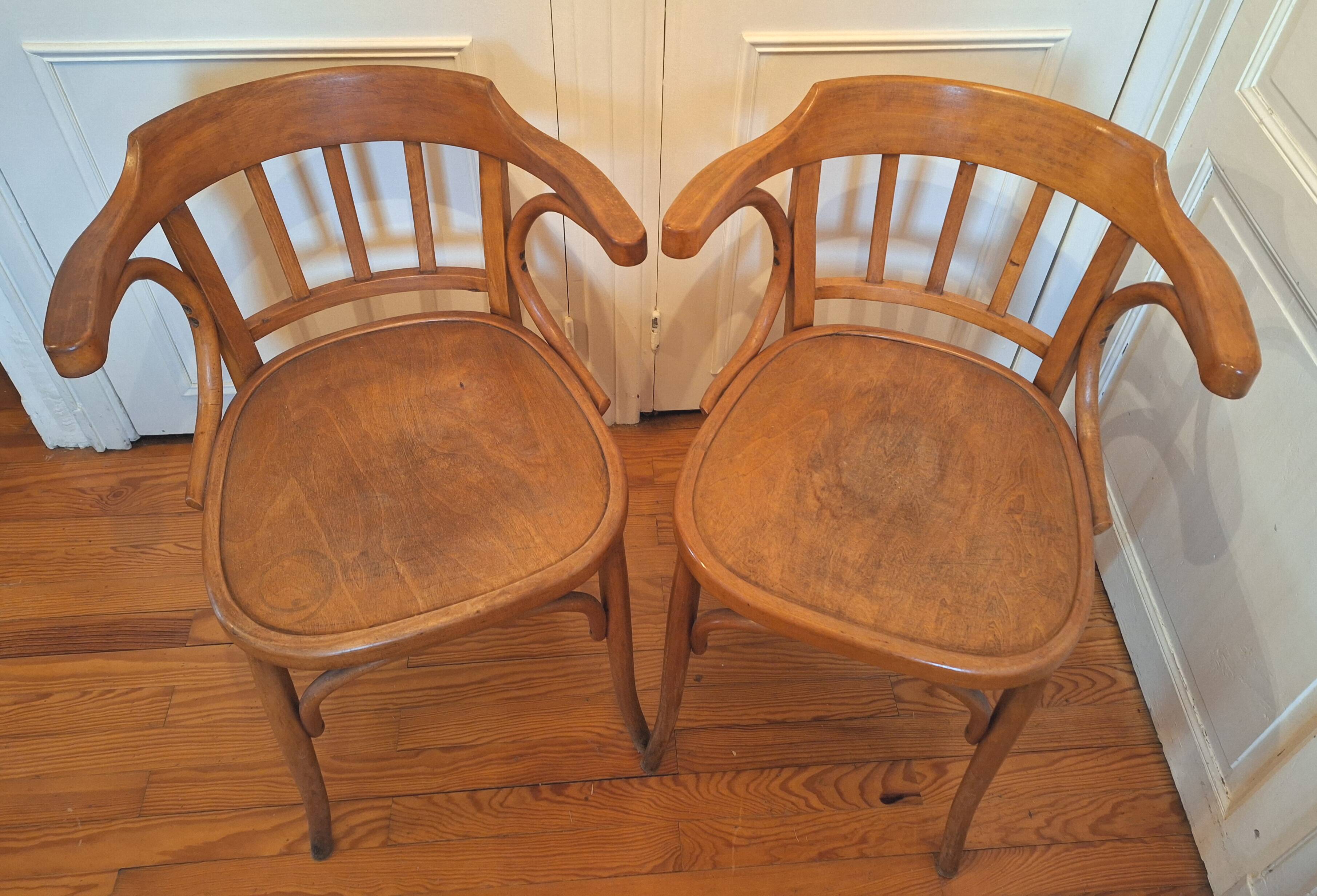 Curved wooden armchair