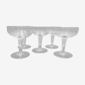 Series of 5 old and engraved champagne glasses