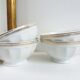 Set 4 old white and gold bowls