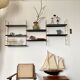 Vintage wall shelves in gold and black metal
