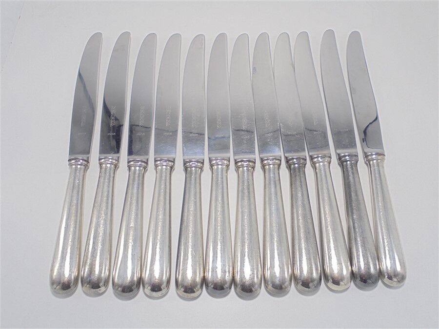 Series of 12 silver knives