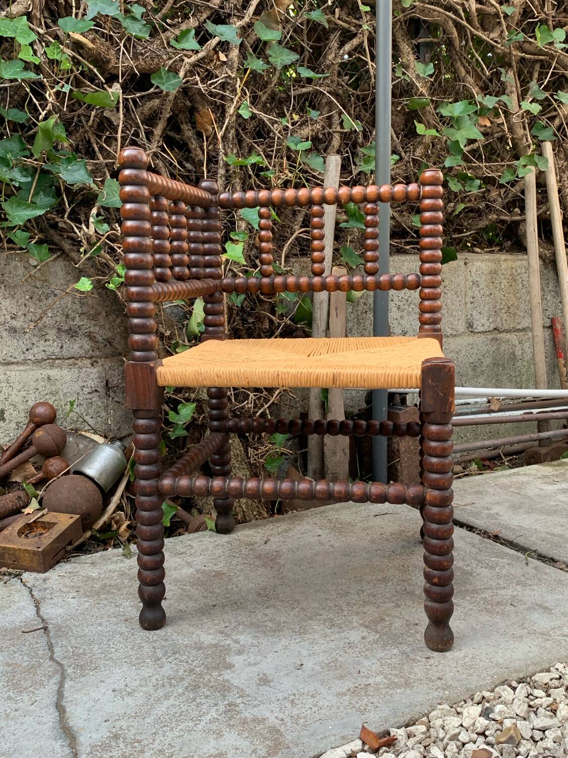 1920s turned wood straw corner chair