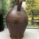 Pitcher in glazed earth in chocolate tones