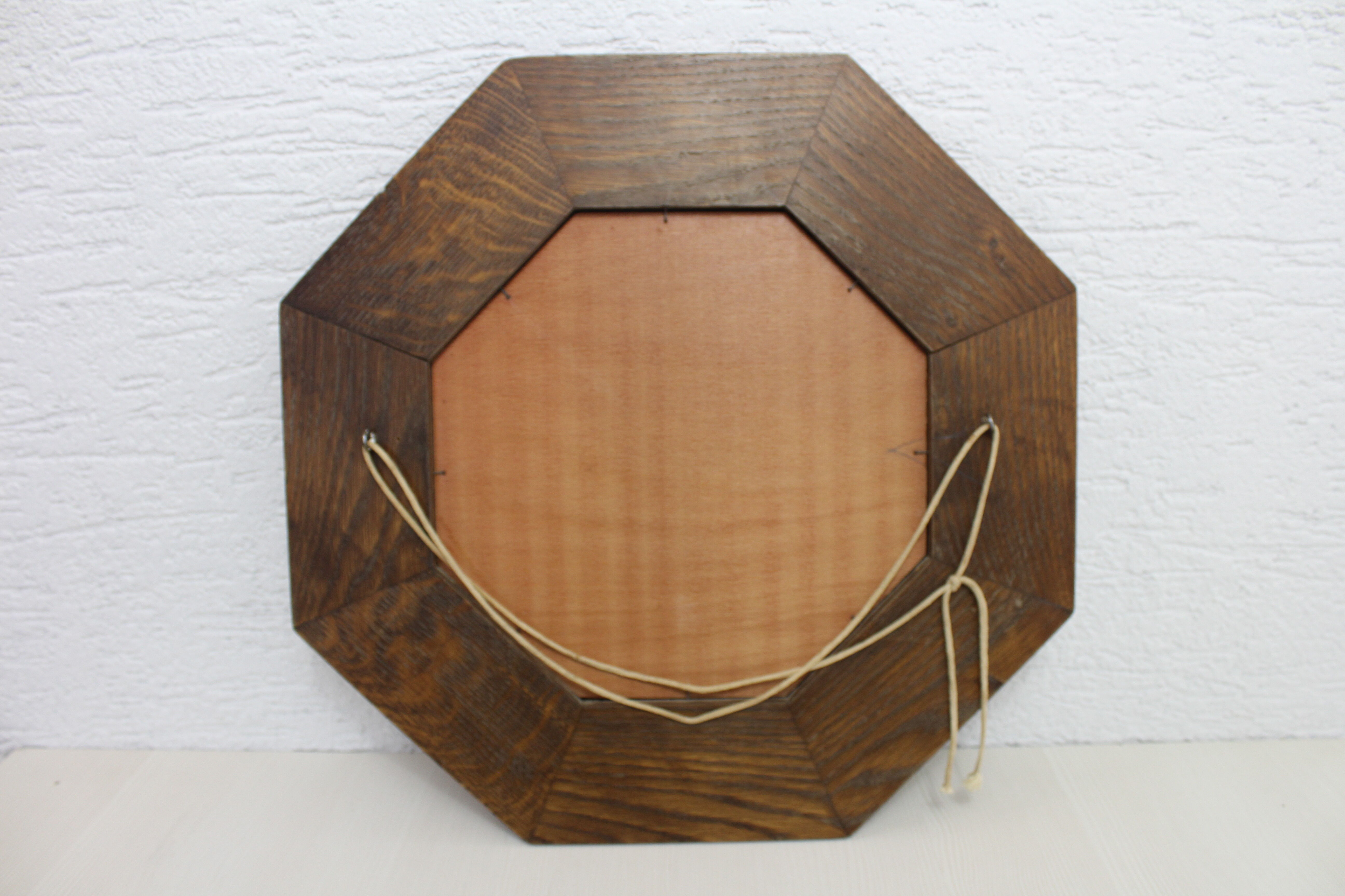 Octagonal oak mirror