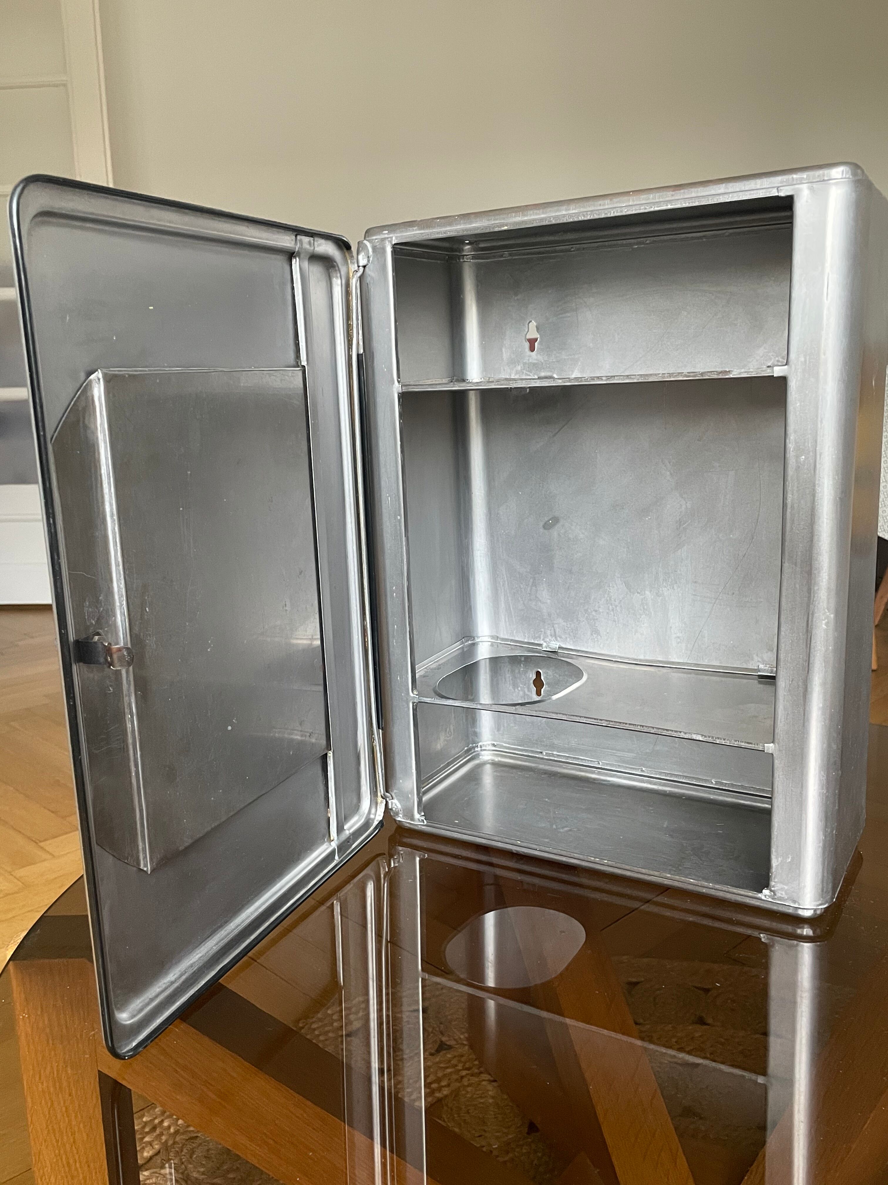 Vintage metal toilet cabinet