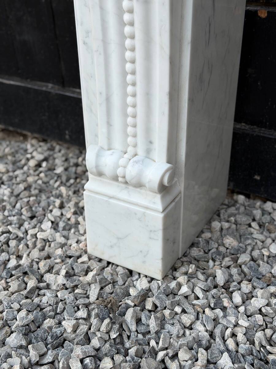 Louis XV style fireplace in Carrara marble, circa 1980.