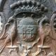 18th-century cast iron chimney plate - crowned lion coat of arms and birds